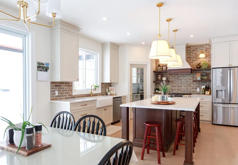 Cranbrook kitchen with painted cabinetry and a red-oak island